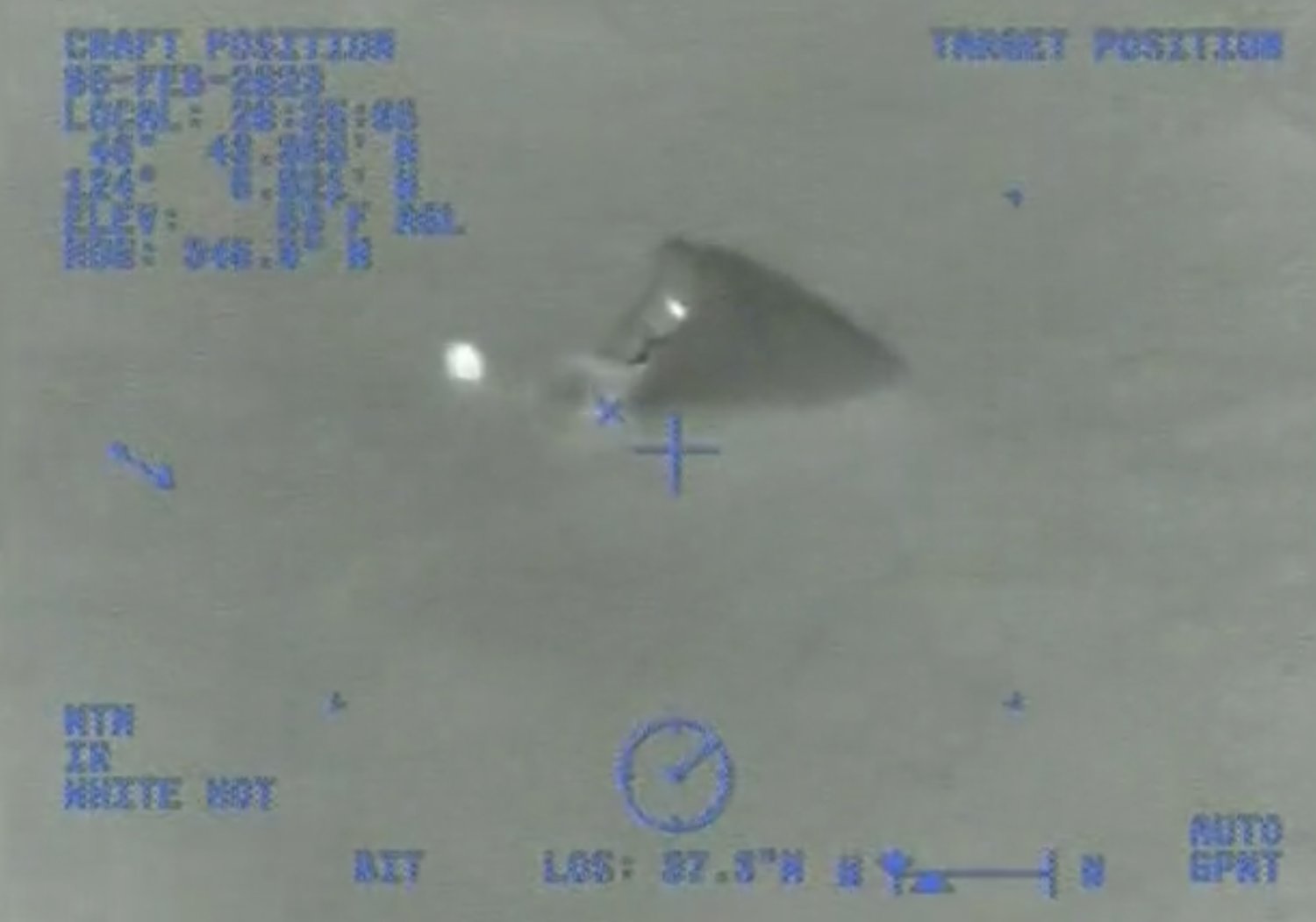 A raft is pictured floating in this still from a Coast Guard video of a rescue off the Southwest Washington Coast on Sunday night.